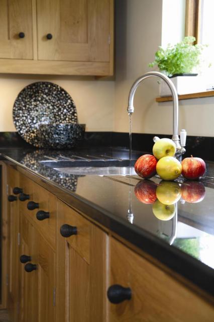 Solid Natural Oak Units with Granite Drainer.